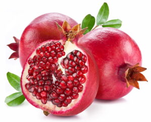 Ripe,Pomegranates,With,Pomegranate,Leaves,Isolated,On,A,White,Background.
